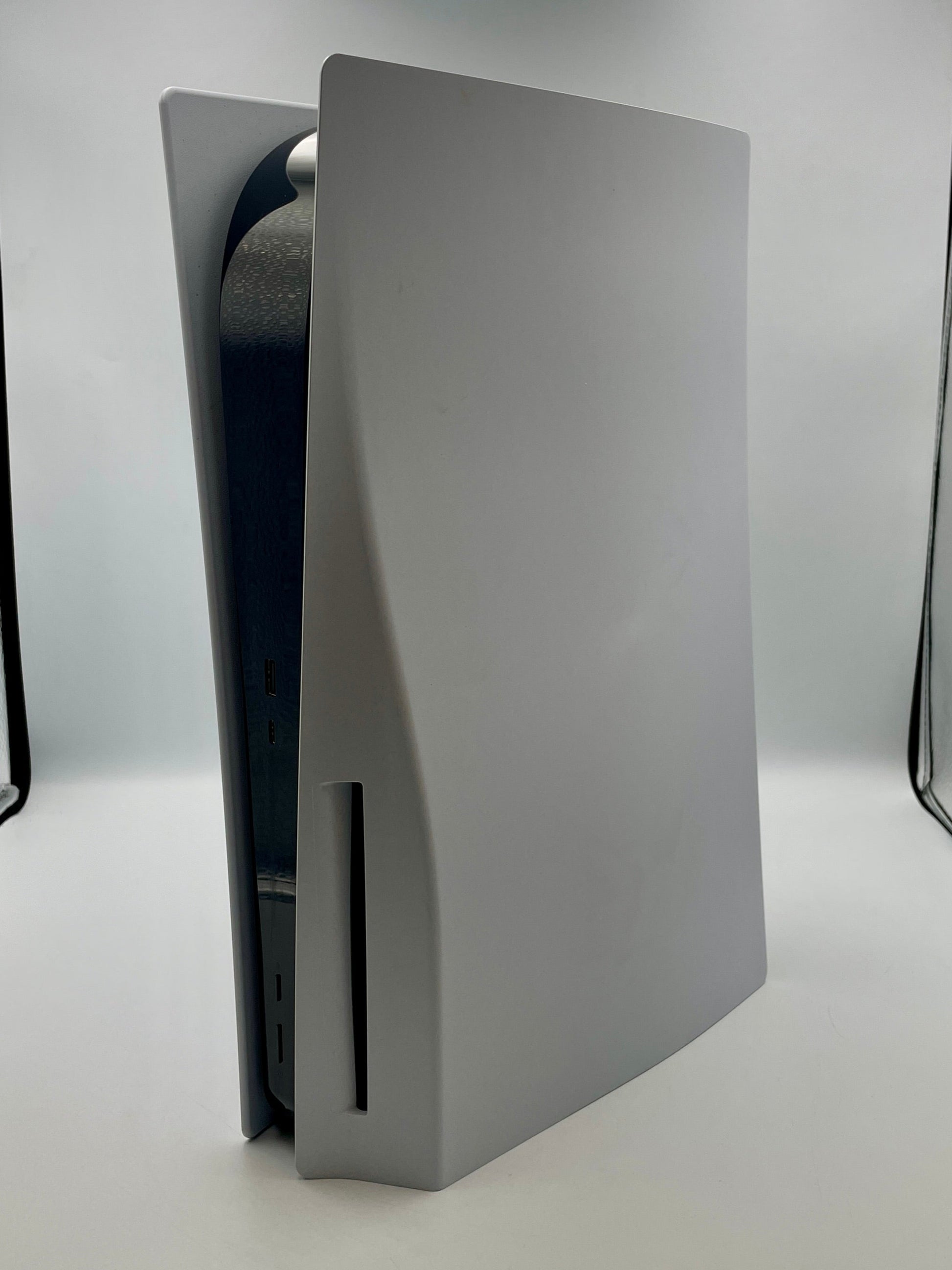 White PS5 console on a white background