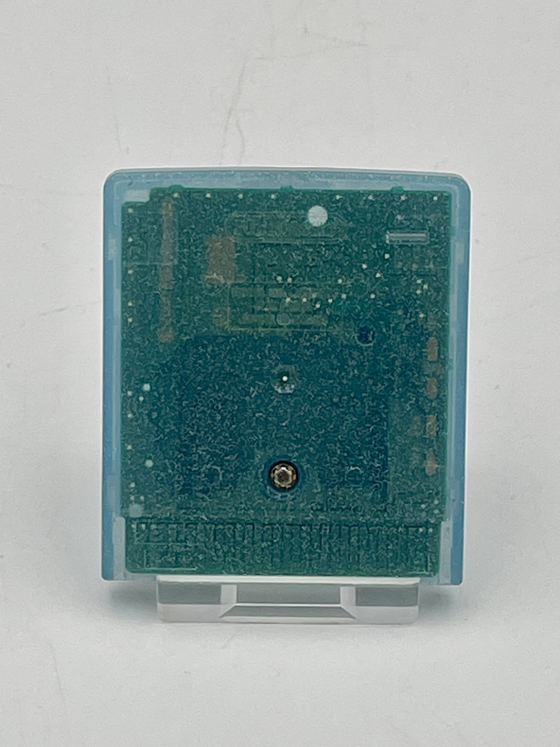 Electronic component with a blue casing on a white background