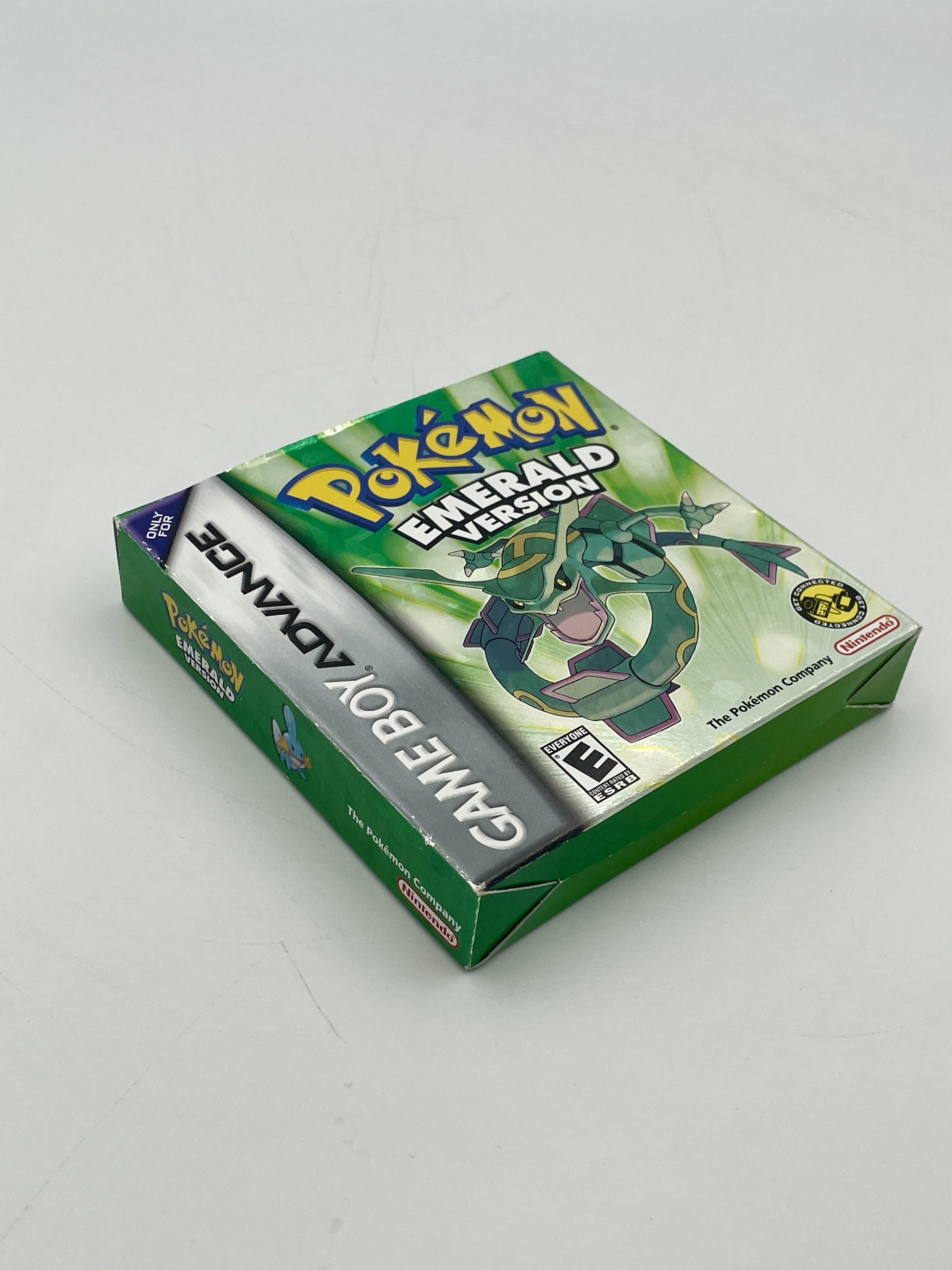Pokémon Emerald Version game box on a white background