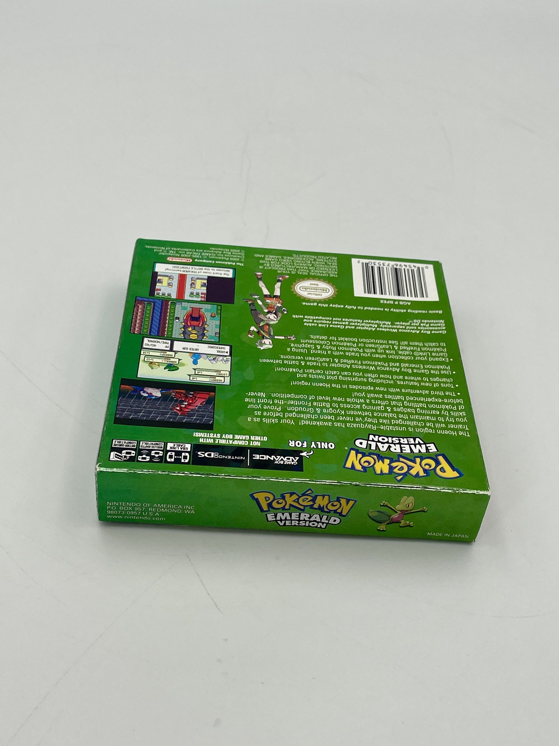 Green trading card game box with Pokémon branding on a white background