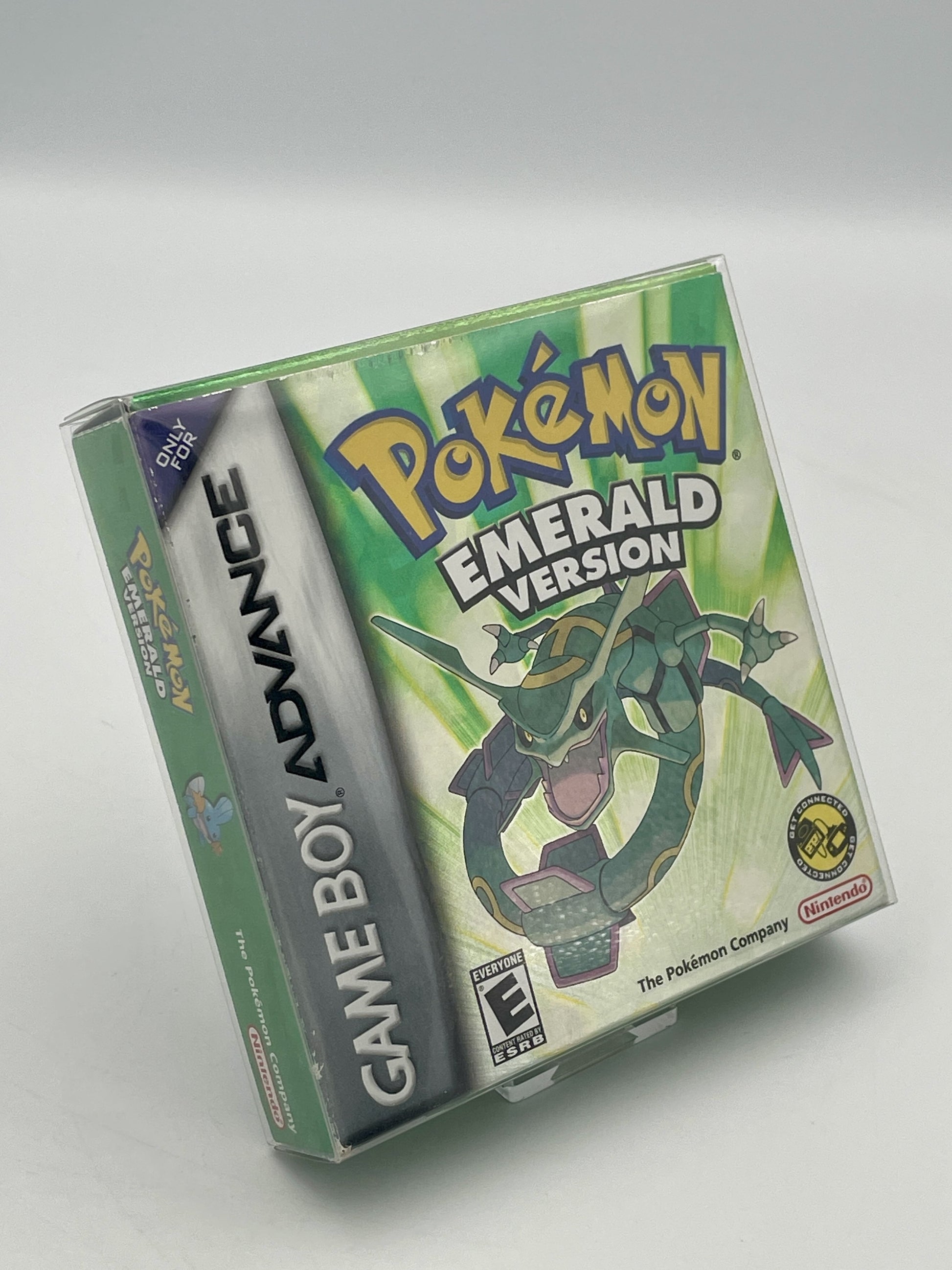 Pokémon Emerald Version Game Boy Advance game case on a white background