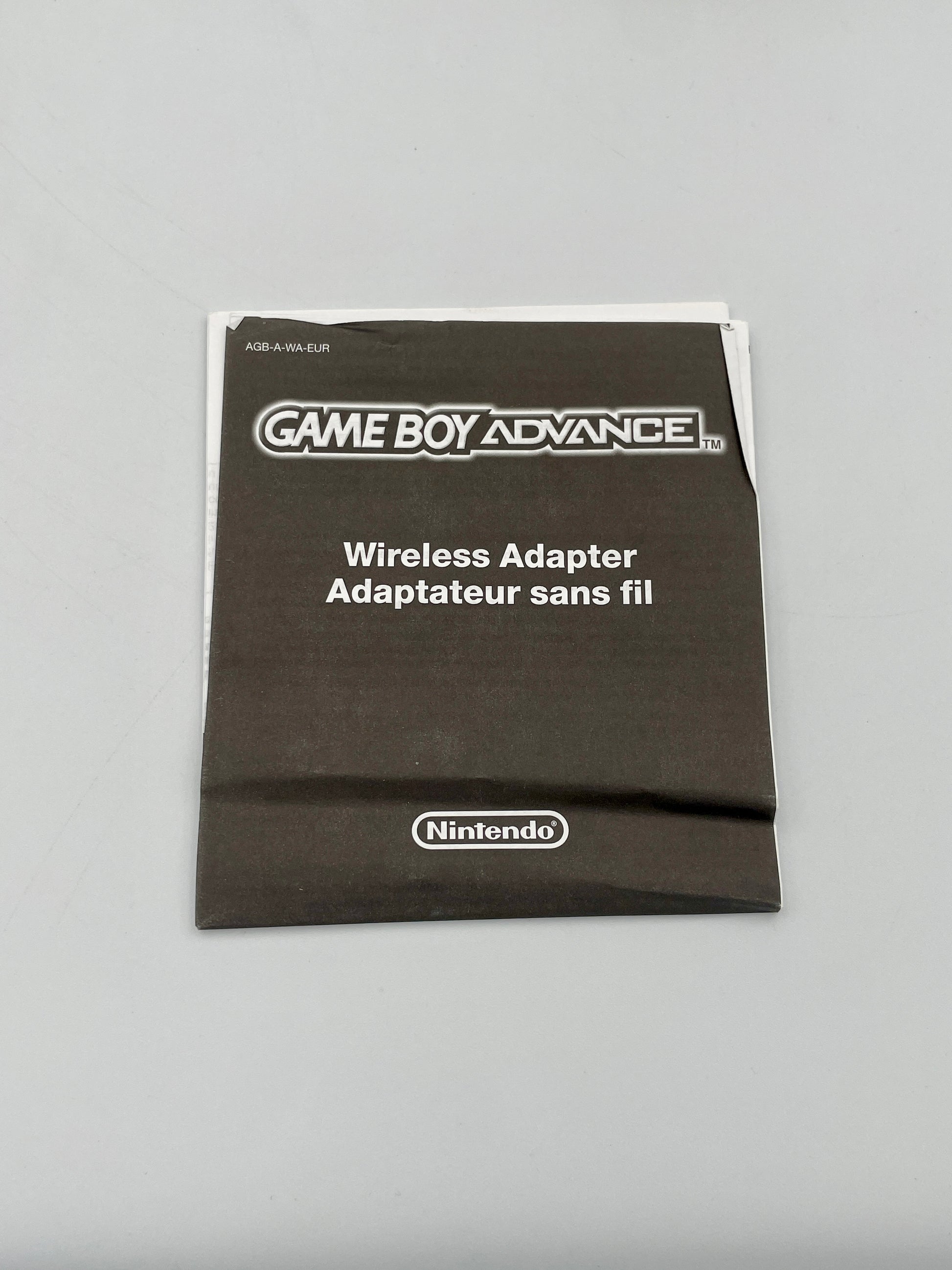 Nintendo Game Boy Advance Wireless Adapter packaging on a gray background