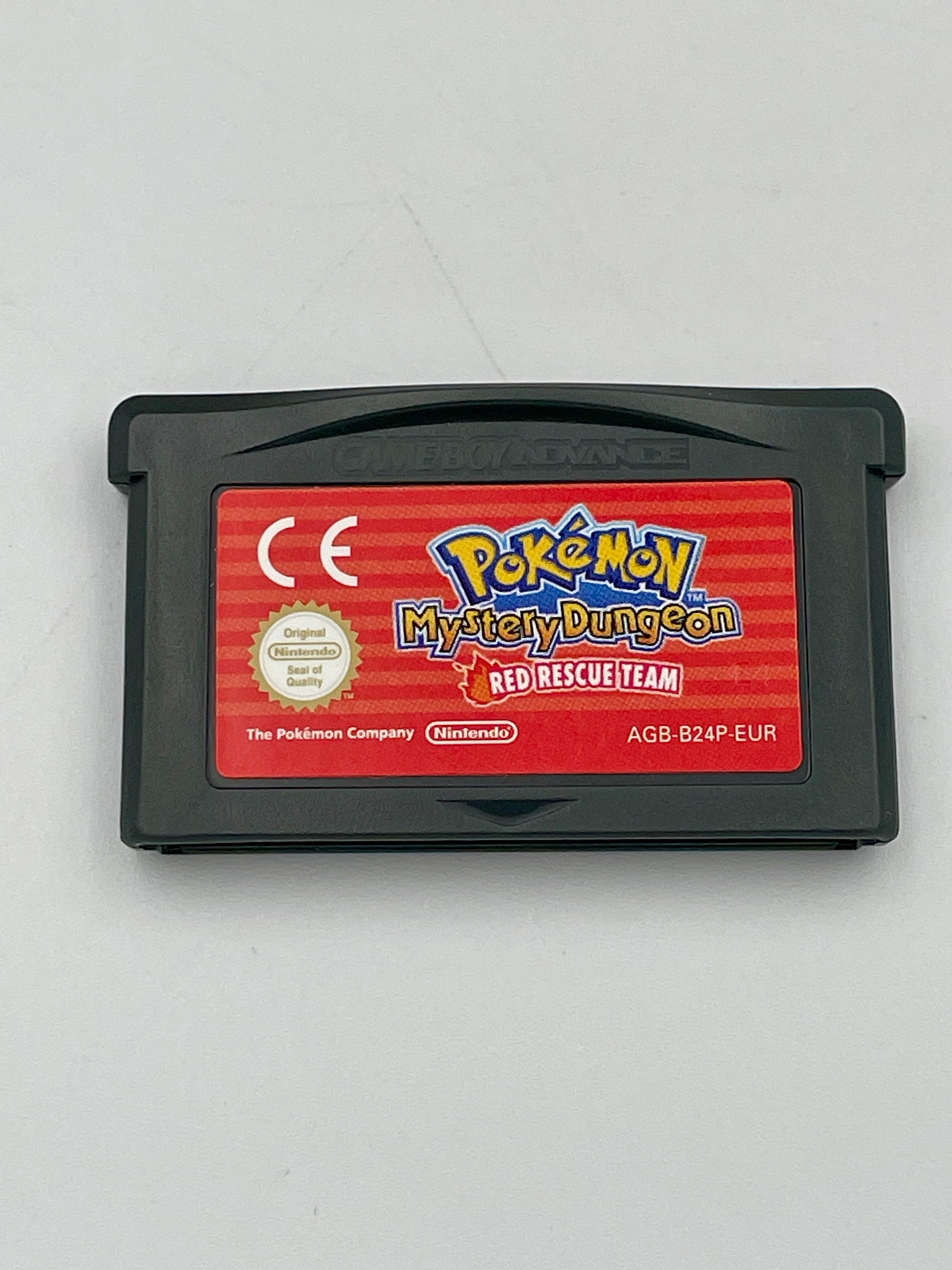 Pokémon Mystery Dungeon Red Rescue Team game cartridge on a gray background