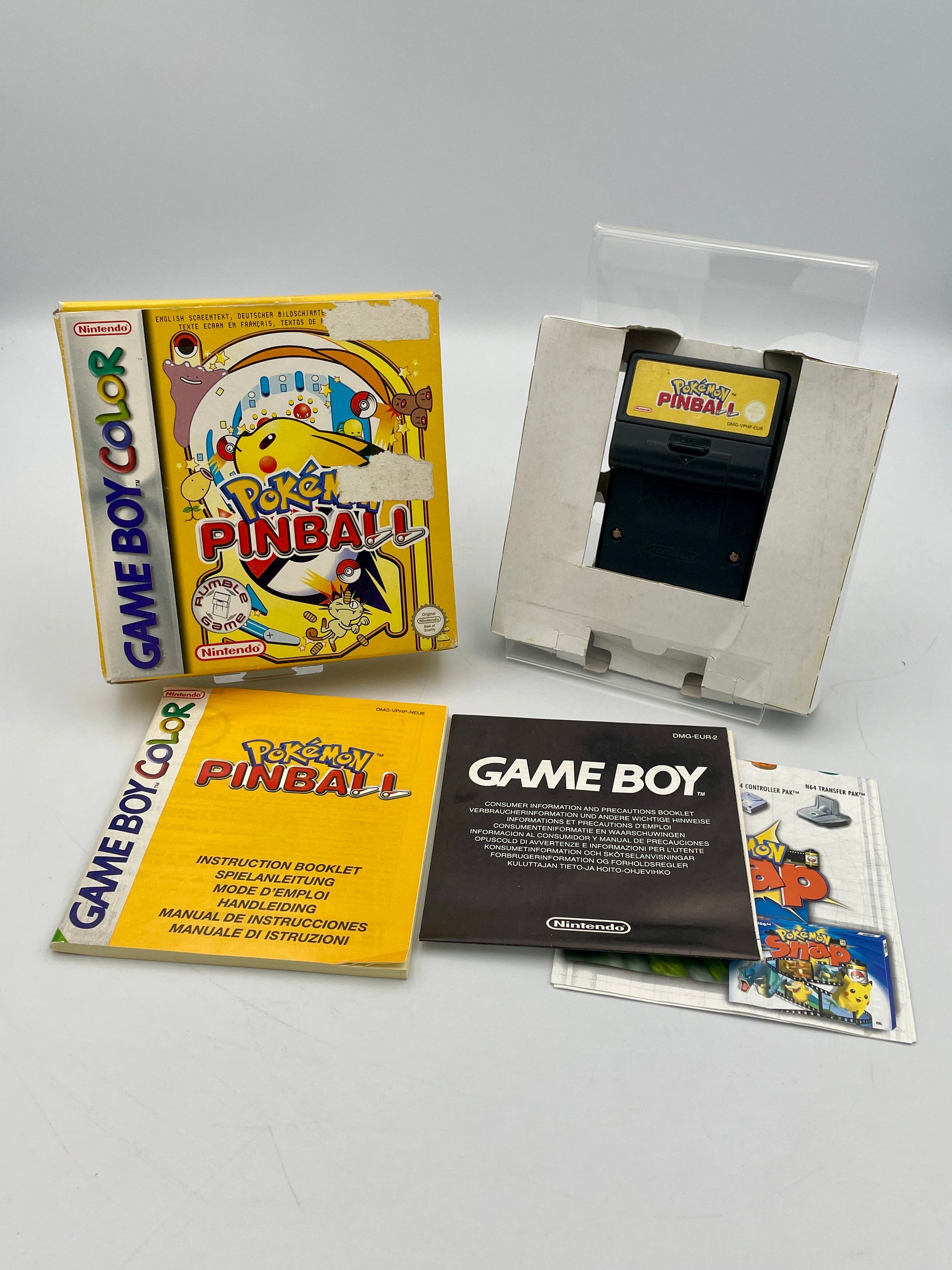 Game Boy Color with Pinball game cartridge and packaging on a white background