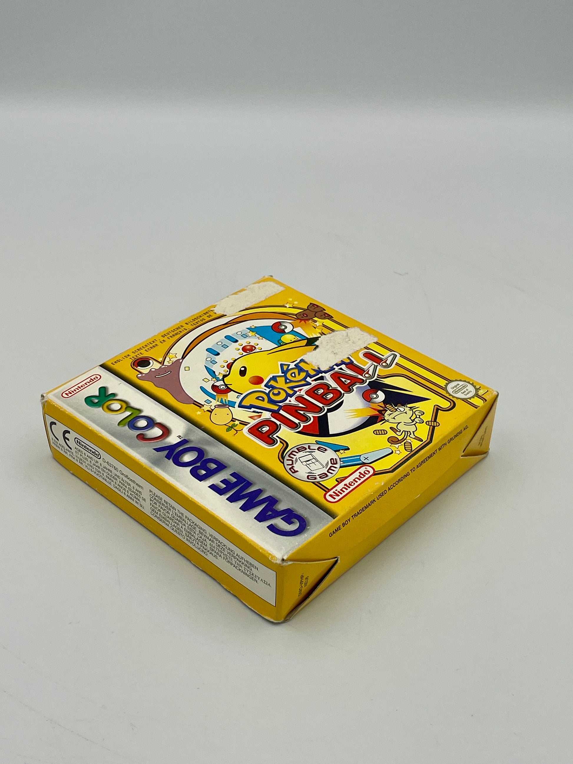 Yellow game box with colorful graphics on a gray background