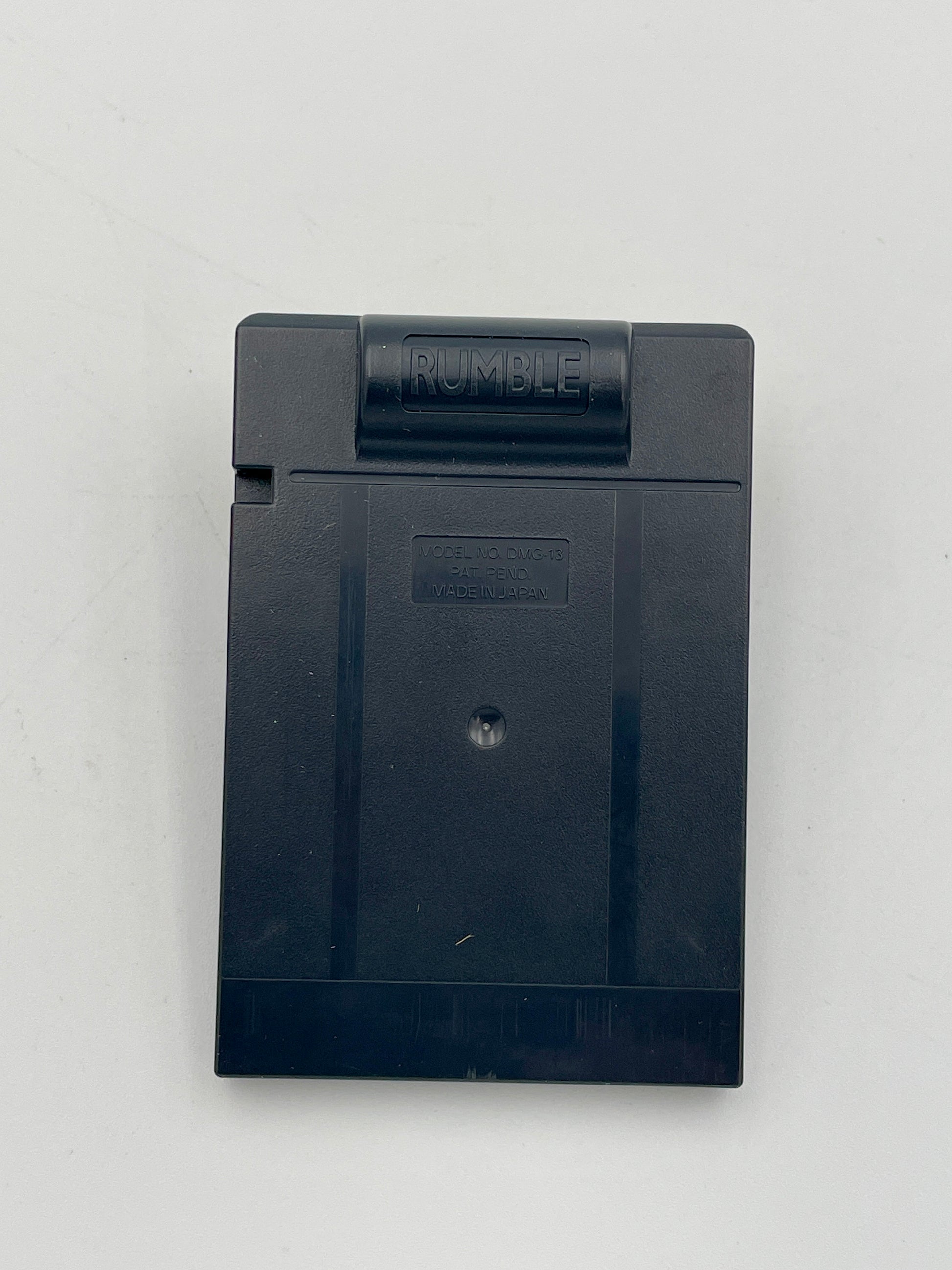 Black rectangular device with 'Rumble' branding on a light gray background