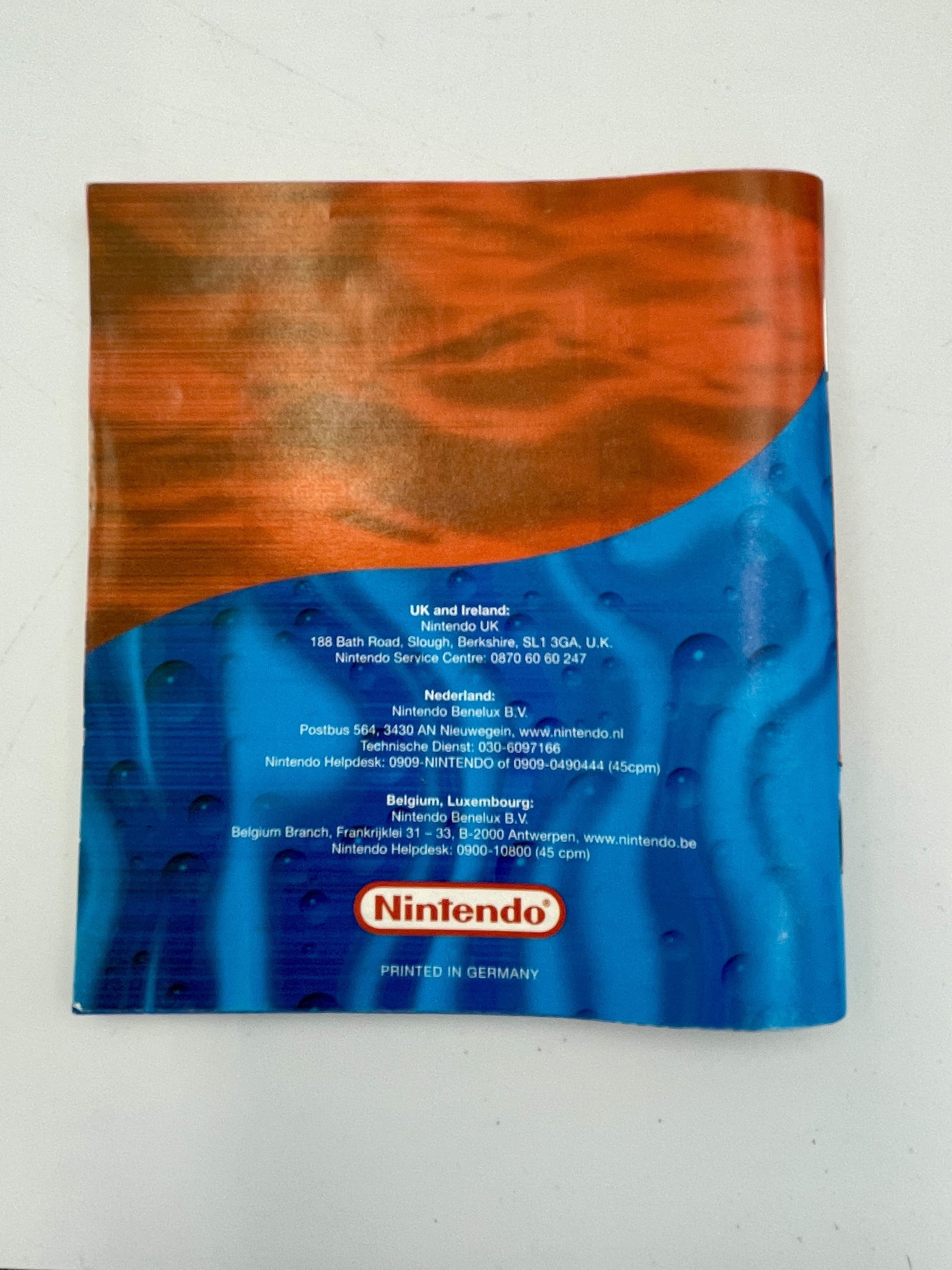 Nintendo packaging with blue and orange design on a white background