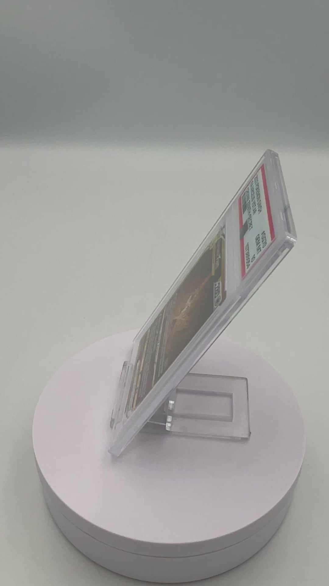 Arceus PSA 10 rotating on a turn table.