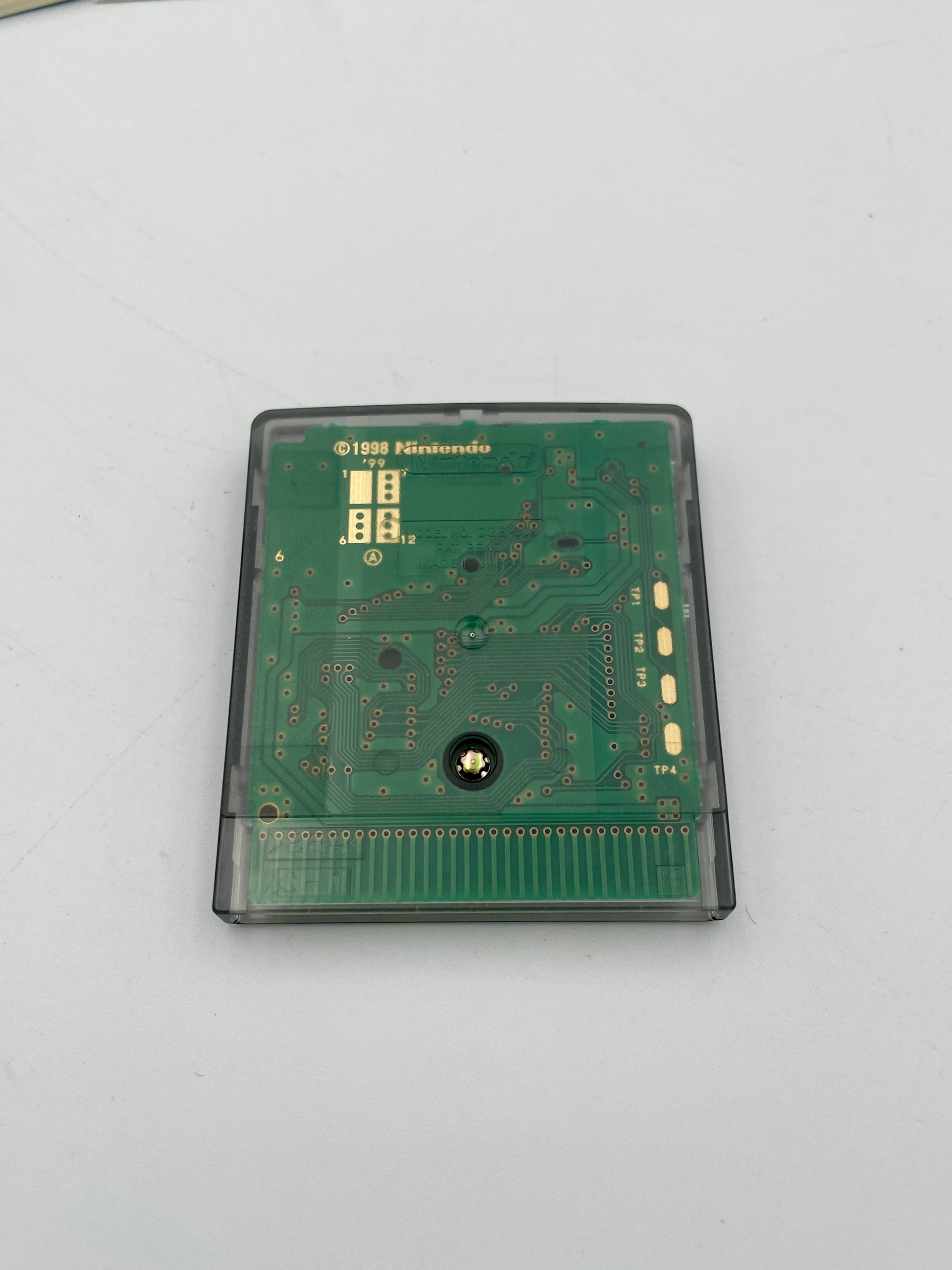 Green electronic circuit board on a white background