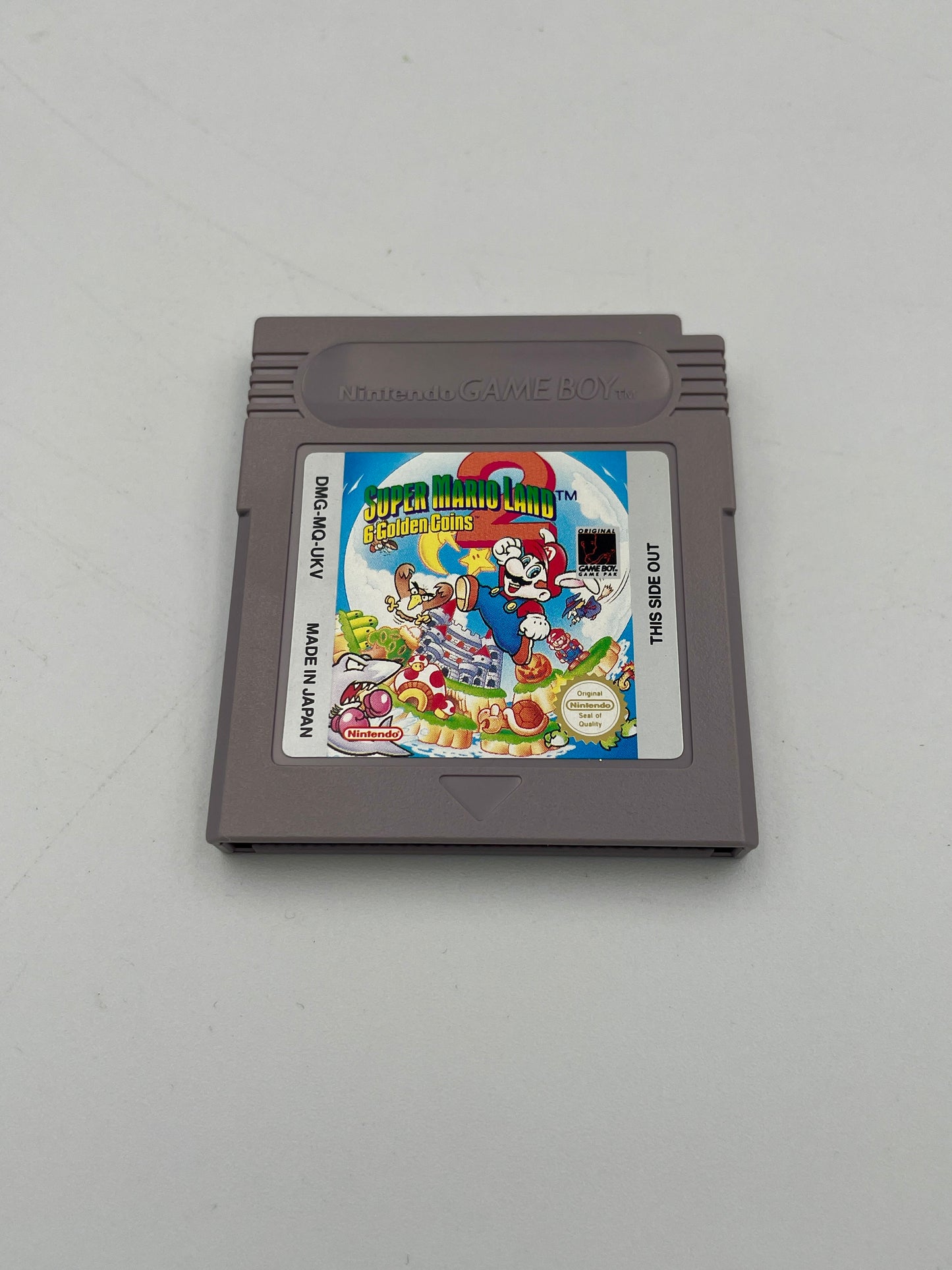 Game cartridge for 'Super Mario Land' on a white background