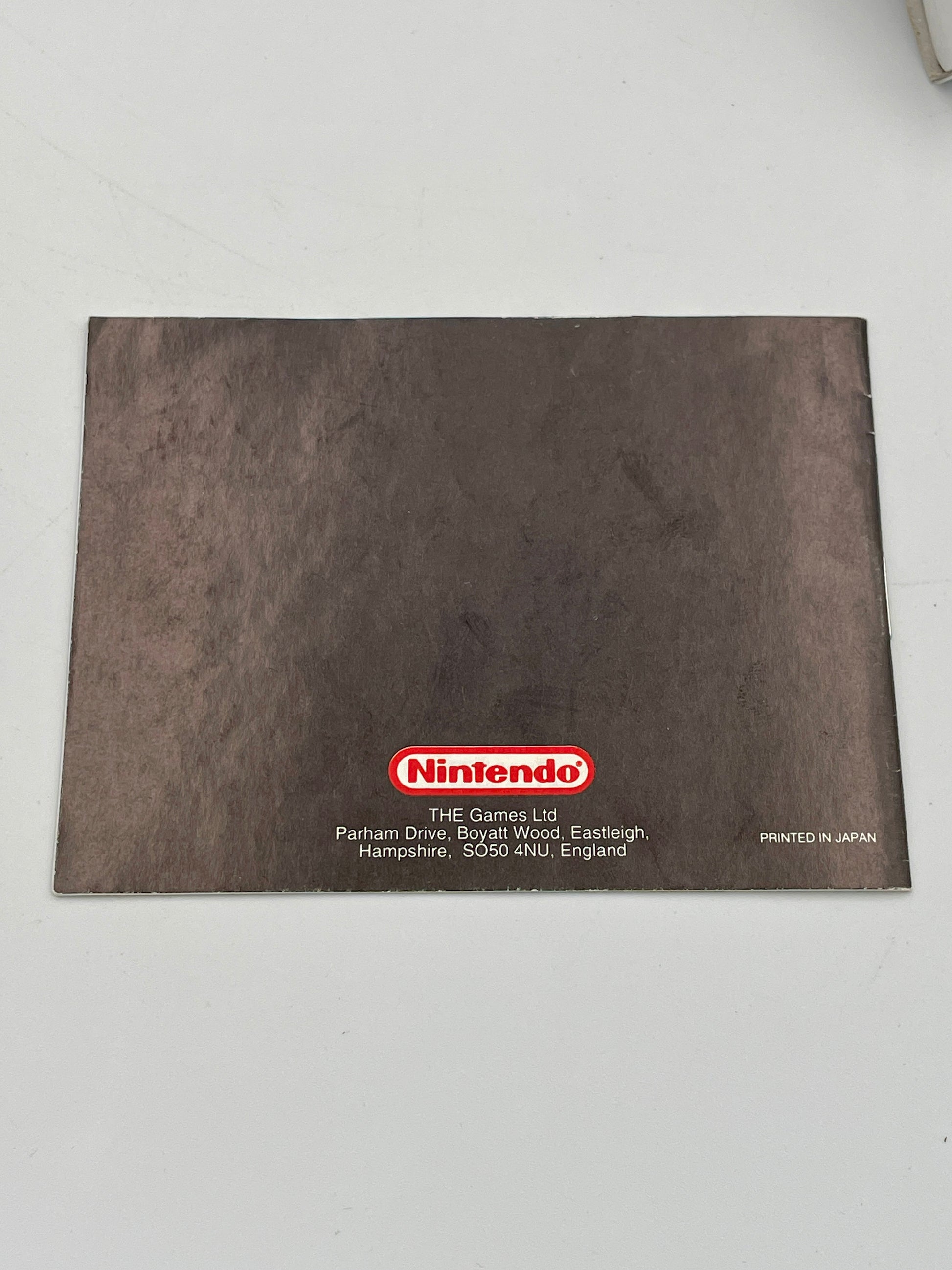 Nintendo branded brown cardboard box on a white background
