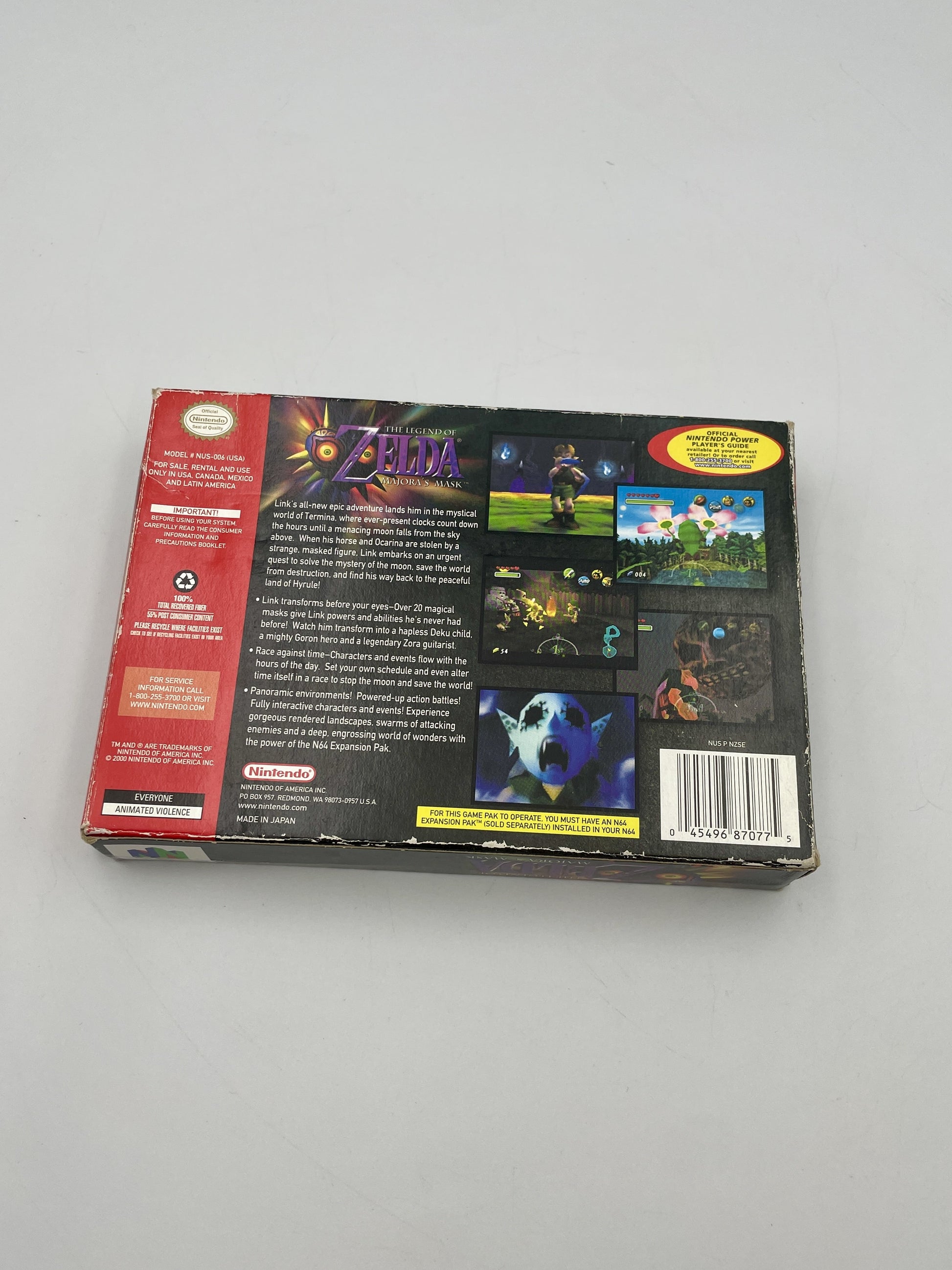 Back view of a 'The Legend of Zelda' game cartridge on a gray background