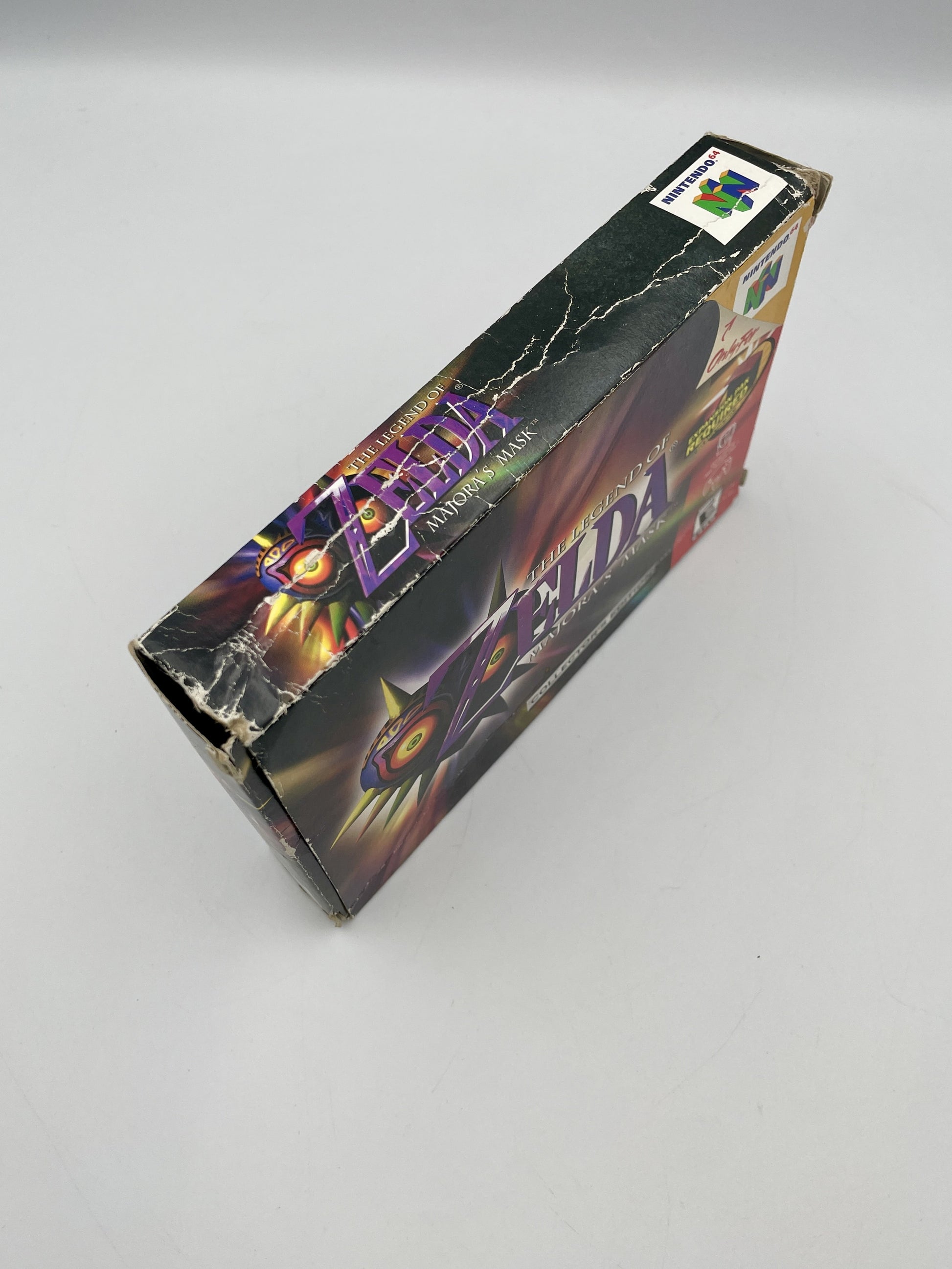Zelda game box with prominent branding on a gray background