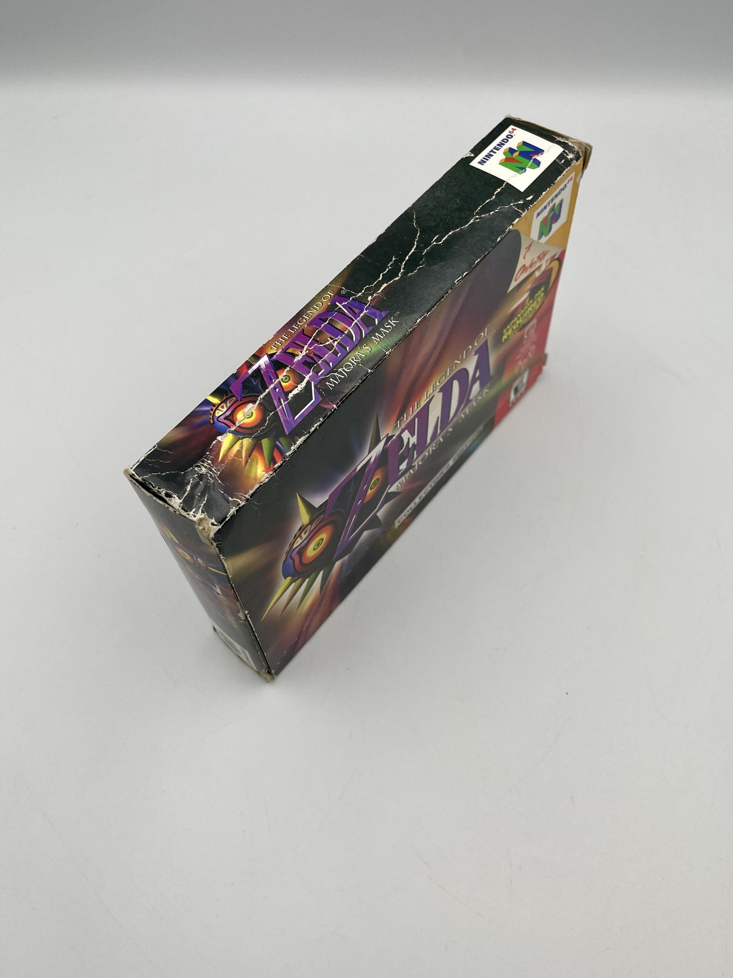 The Legend of Zelda game box for Nintendo 64 on a gray background