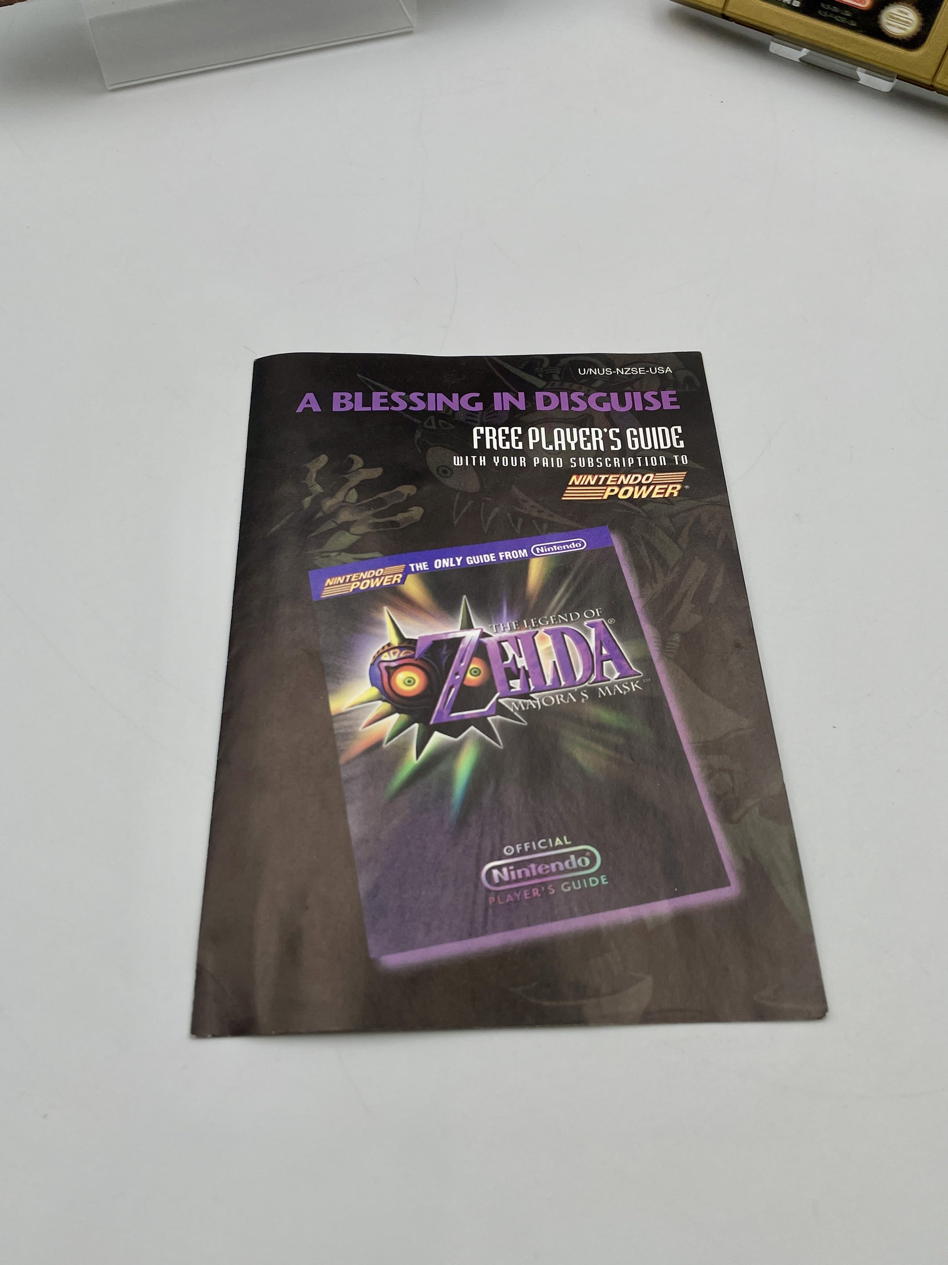 Game guide book for 'The Legend of Zelda' on a white surface