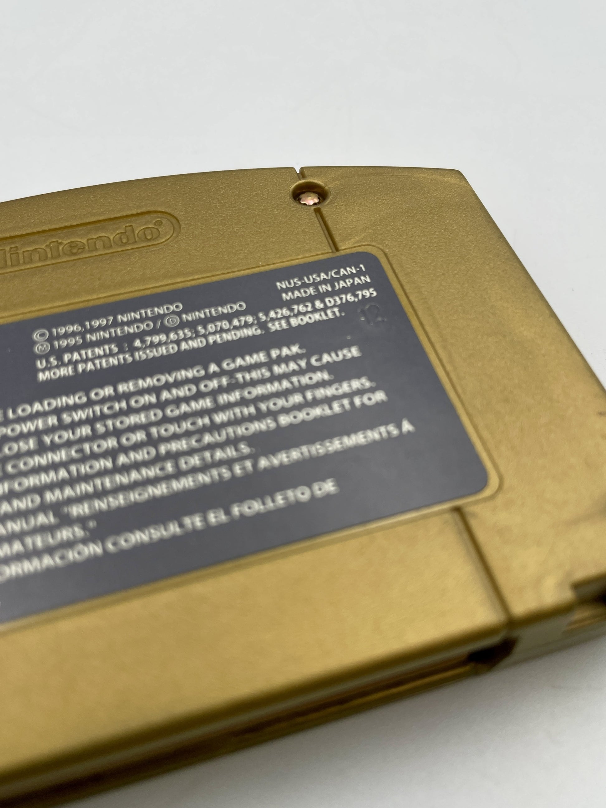 Close-up of a Nintendo Game Boy cartridge with text on a white background